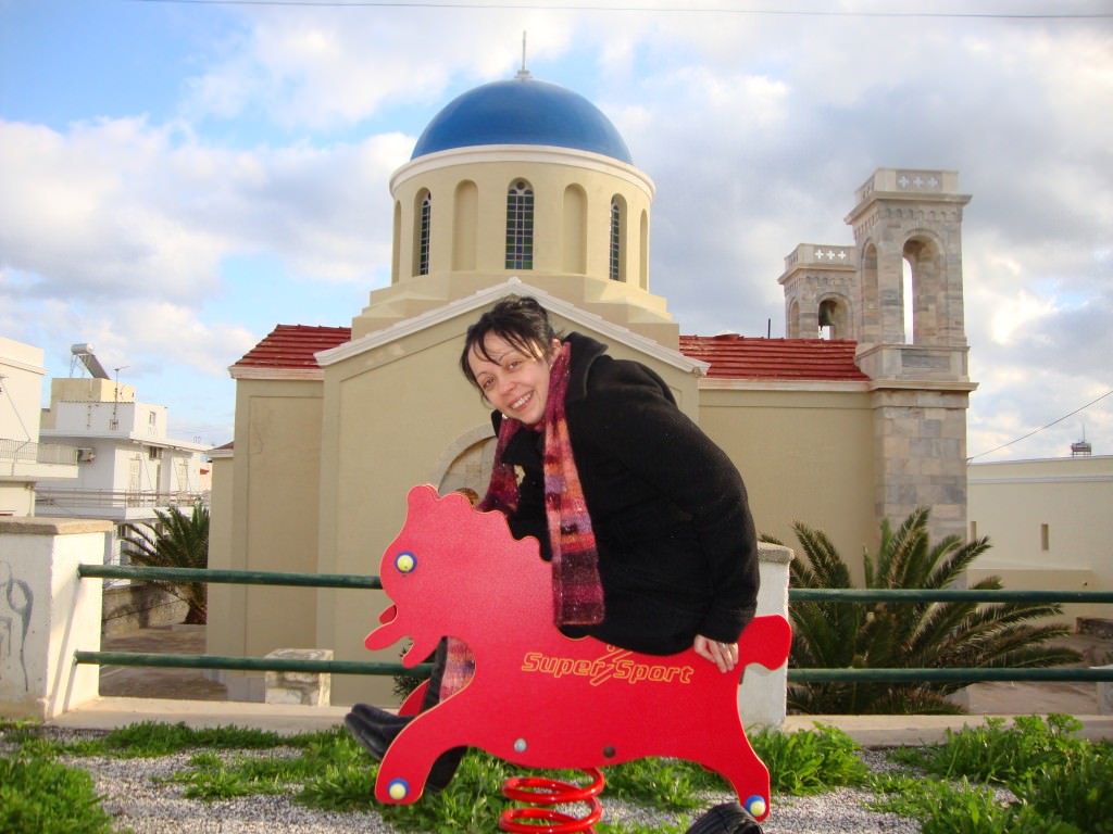 Playground in front of a Greek orthodox church in Syros, best Greek Cyclades island