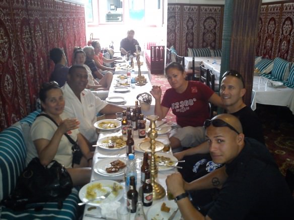 Our friends enjoy their traditional Moroccan lunch...before the hell began...