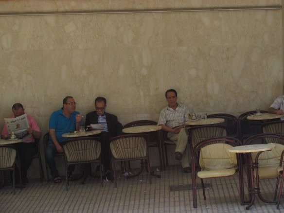 Moroccan men lounge in a cafe in Tangier