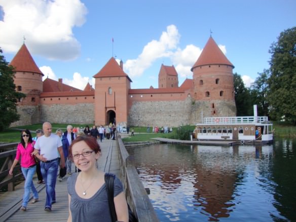 Bell in front of the Trakai castle in Lithuania