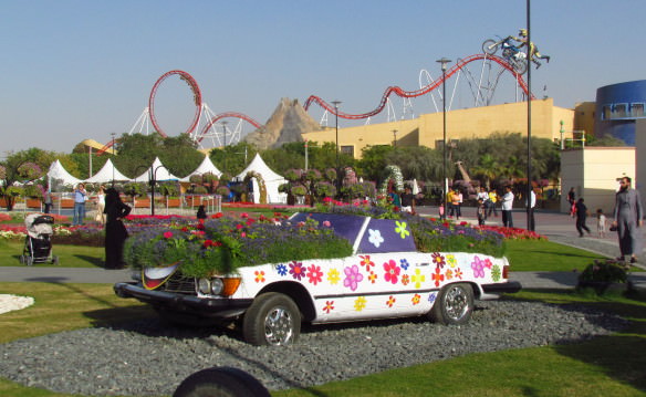 A classic Mercedes decorated with flowers at Miracle Gardens Dubai