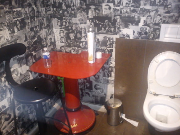 table and chair in toilet in France