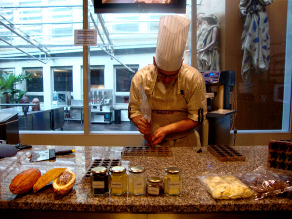 Guy making Belgian chocolates