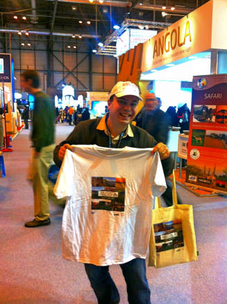 Alex with his Angola freebies - FITUR