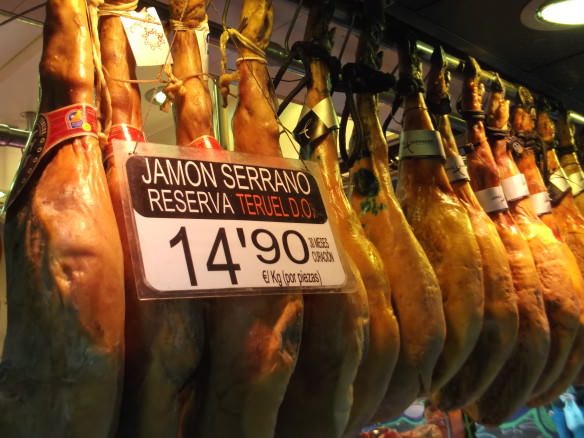 Spanish jamon hanging in the market