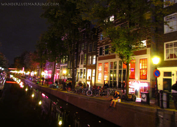 Canal houses in the red light district of Amsterdam at night