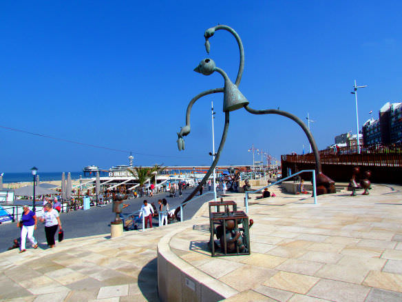 Scheveningen, Netherlands beach sculpture of guy eating a herring fish