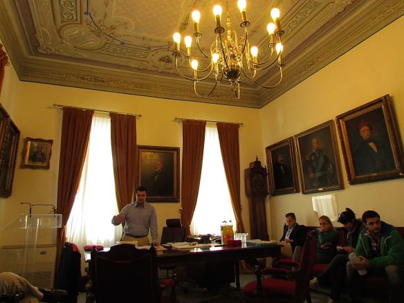 The Mayor of Hydra hosts our press group in his office to discuss the affairs of the island.