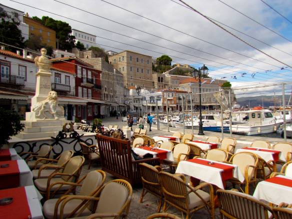 Cafe seating by the harbor in Hydra