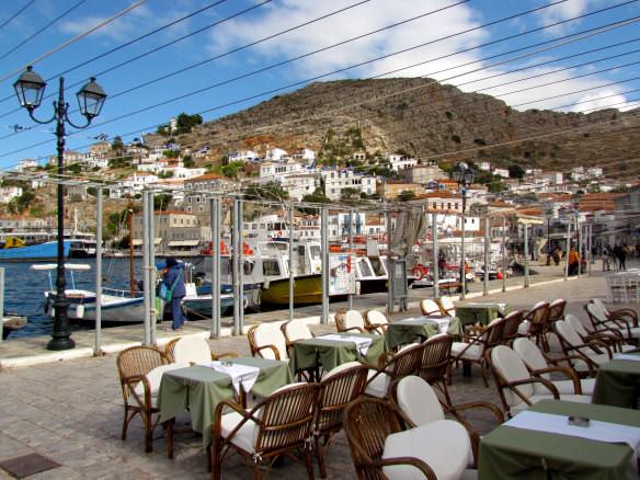 tables along the marina in Hydra, Greece