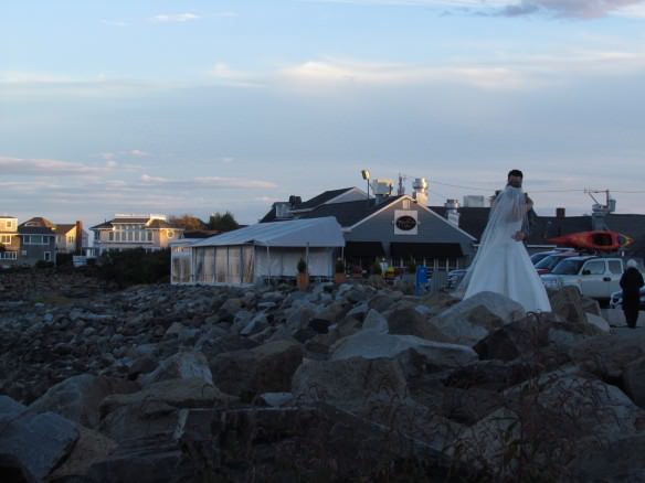 A just married couple at sunset in Ogunquit, Maine.