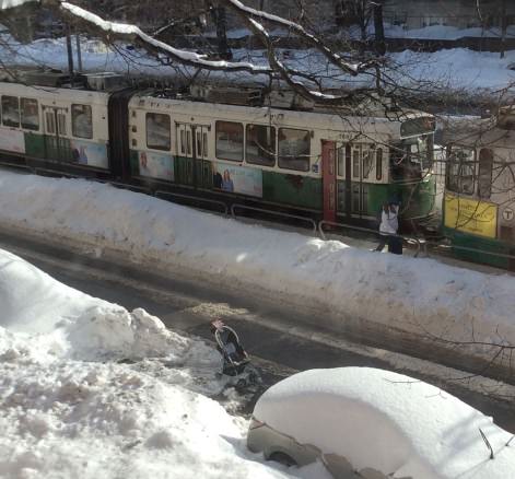 Many people who clear their cars out of a mountain of snow attempt to hold their spot.