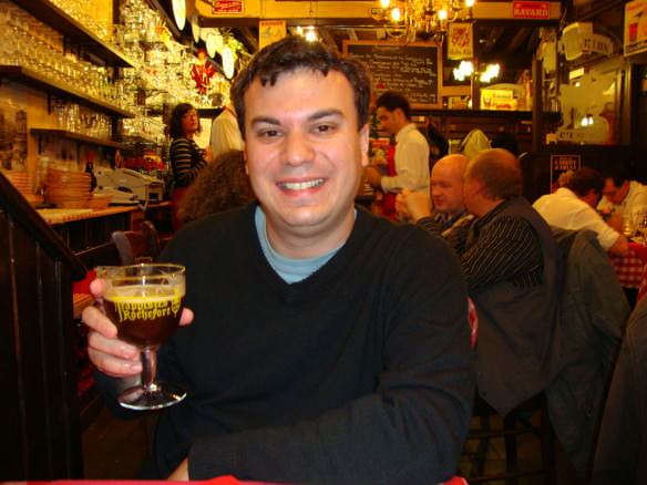 Alex with a beer in Brussels