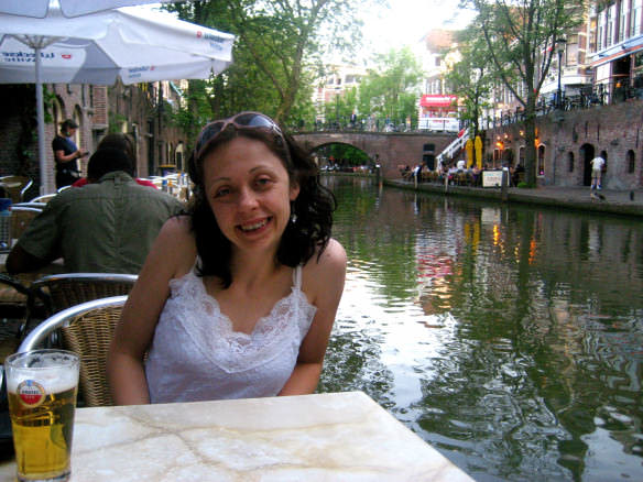 drinking an Amstel beer along the canal in Utrecht 