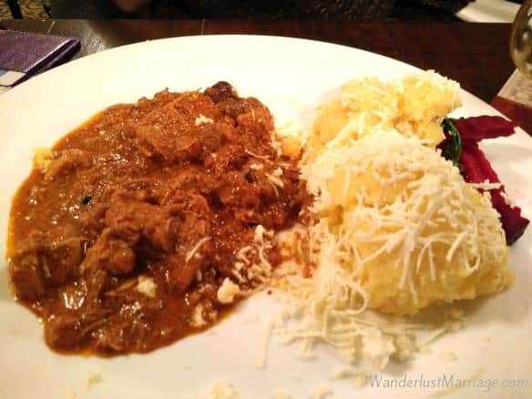 Moldovian goulash with mamaliga (polenta with cheese) at Caru cu Bere