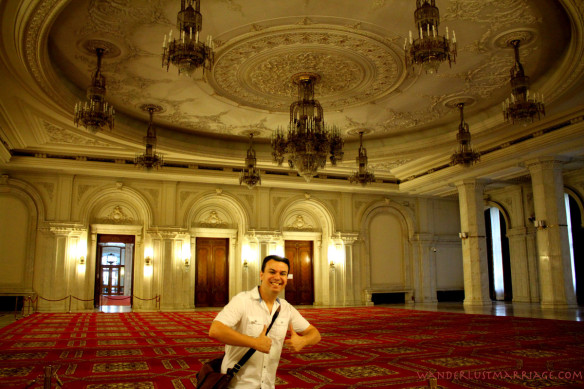 Alex mockingly gives 2 thumbs up to the lights not working inside Bucharest's Palace of Parliament