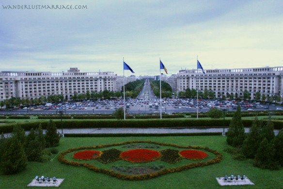 View of gardens, buildings and a wide boulevard in Bucharest, Romania from the Palace of Parliament balcony