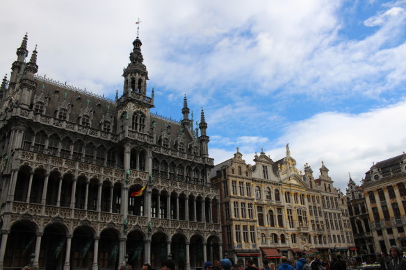 partly cloudy sky over Town Hall in Brussels' Grand Place