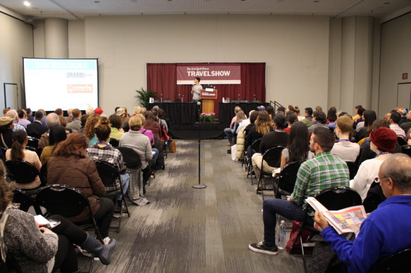 Nomadic Matt encourages a packed audience to participate in the sharing economy to save on travel.