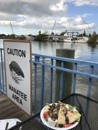 The Limani Greek salad topped with pork on the Sponge Docks in Tarpon Springs, Florida