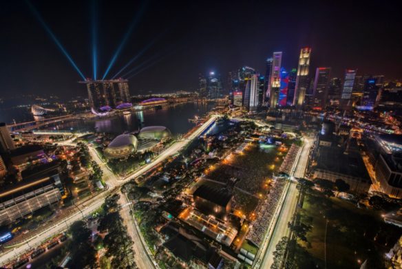 Lights emanate at night from a building in Singapore