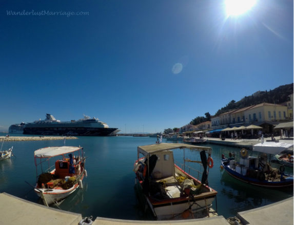 Katakolo's harbor with small boats and cruise ships docked in harbor