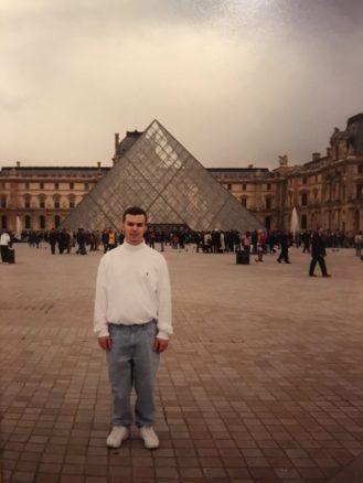 Alex in front of the Louvre Paris