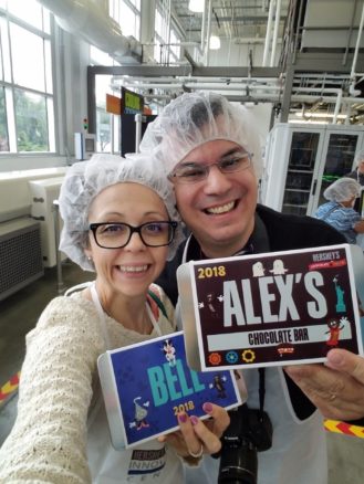 Alex & Bell with their chocolate bars in the build your own chocolate bar factory