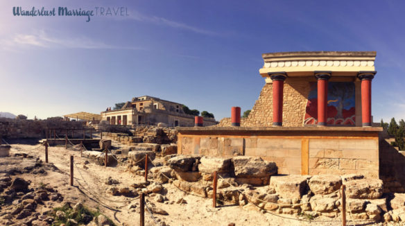 Palace of Knosos wide angle photo with red colored columns, Minotaur fresco and walkway 