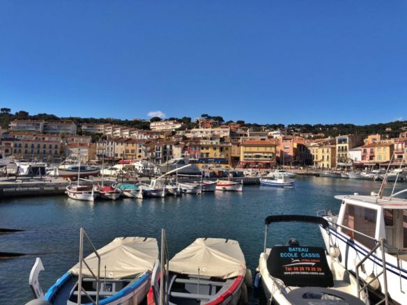 Harbor with boats and village in Cassis, South of France