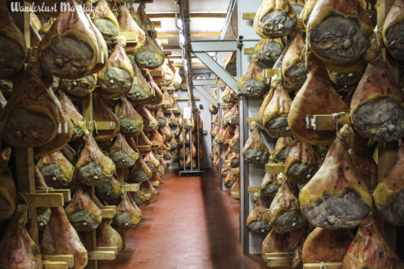 hundreds of prosciutto legs hanging to dry