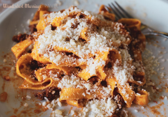 Plate of fresh spaghetti and parmesan cheese