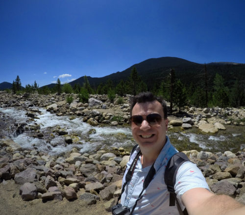 Alex selfie in front of river in the rocky mountain park