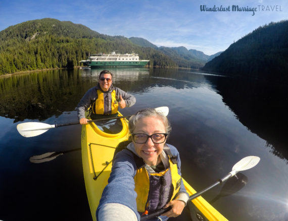 Alex & Bell in a Kayak, with fjords and the cruise ship in the background