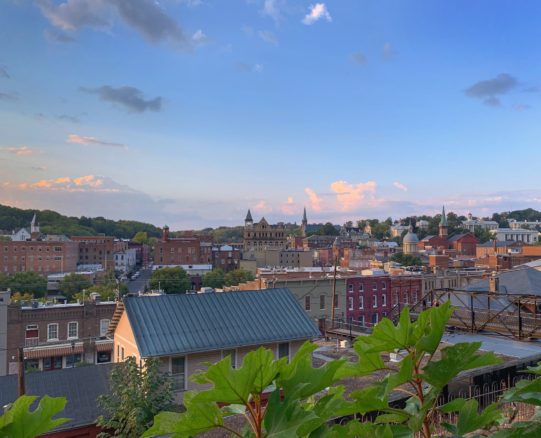 landscape overlooking the town of Staunton with blue skies and pink clouds