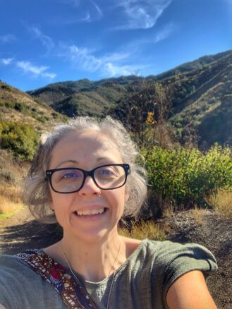 Bell hiking in the Boney Mountain park with beautiful blue skies