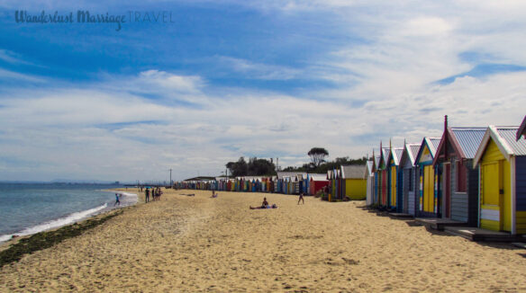 Colorful Brighton beach houses and the ocean