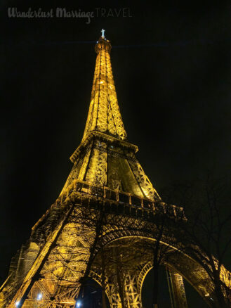 Eiffel tower lit up at night