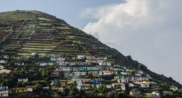 colorful houses built into the side of the mountain