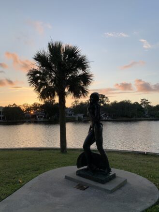 sunset view of a statue in Craig Park in Tarpon Springs, Florida