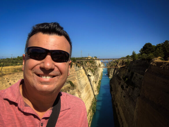 Alex in the middle of the pedestrian bridge overlooking the Corinth Canal