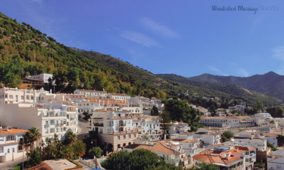Apartments and villas white-washed with terracotta roofs nestled in the mountains of Costa del Sol
