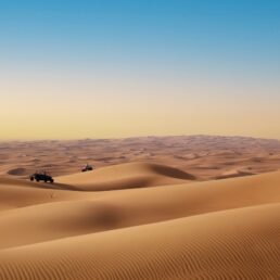 An ATV vehicle on the rolling dunes of the Dubai Desert in the United Arab Emirates.