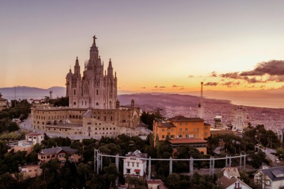 Sunset over Tibidabo Hill in Barcelona, Spain.
