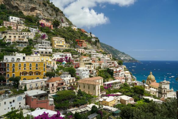 Colorful buildings cascade along the mountain in Positano, in the Amalfi Coast of Italy.