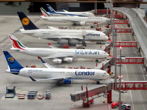Airplanes at Airport Gates including Condor and Air France planes.