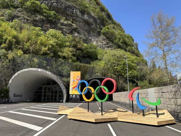 The Olympic rings and Paralympic symbol on display outside the Galleries of Trento, former WWII era tunnels