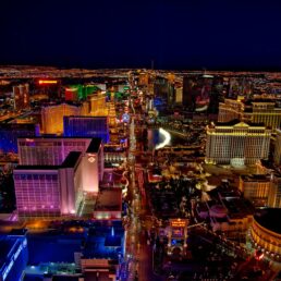 An areal photo of the bright lights of Las Vegas, Nevada at night.