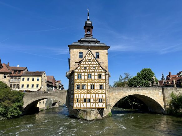 Altes Rathaus in Bamberg, Germany with a blue sky overhead.