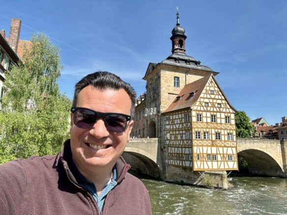 A selfie of Alexander Kallimanis of Wanderlust Marriage Travel at Altes Rathaus in Bamberg, Germany.